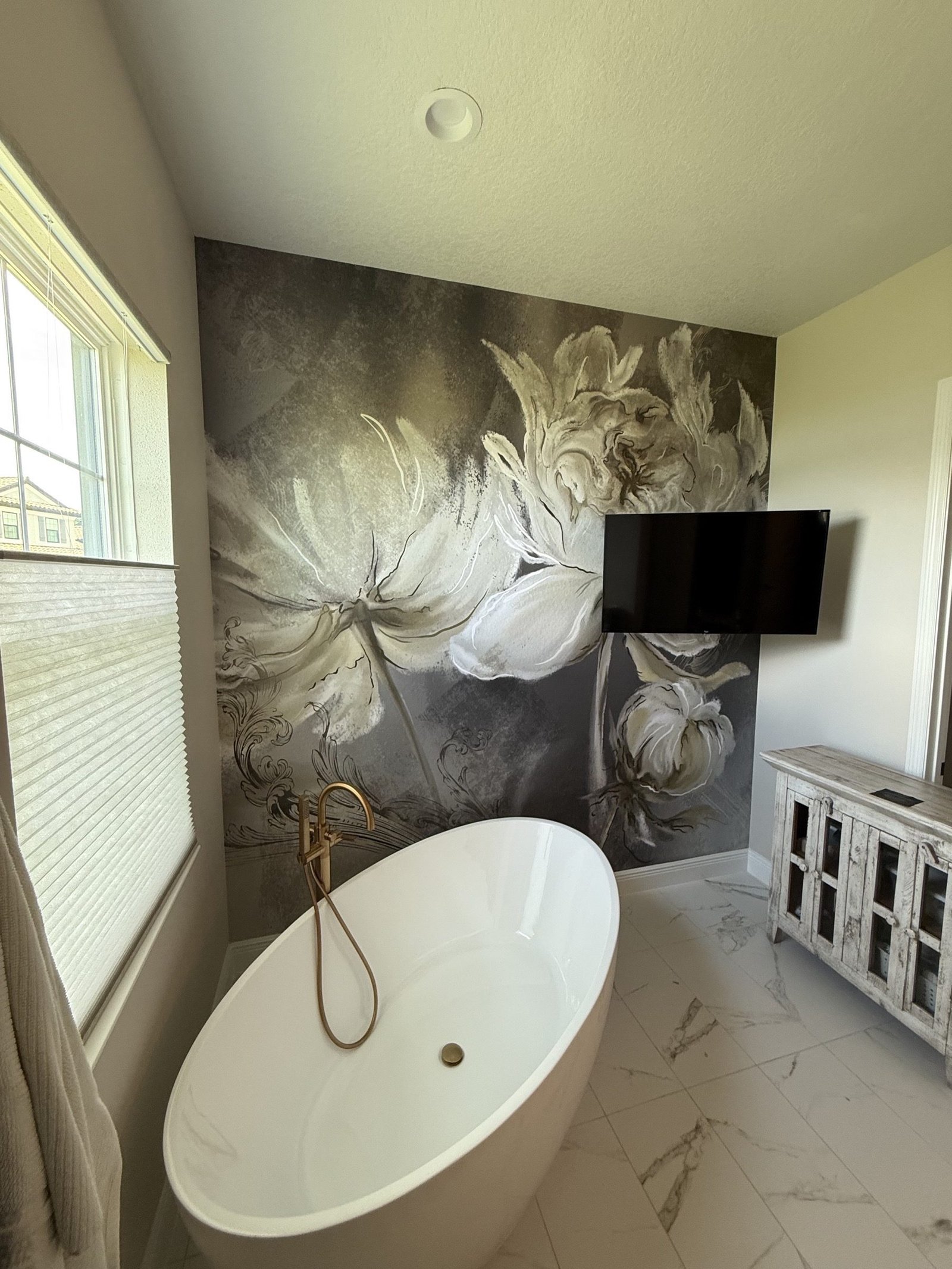 Large botanical bathroom mural professionally installed in Florida