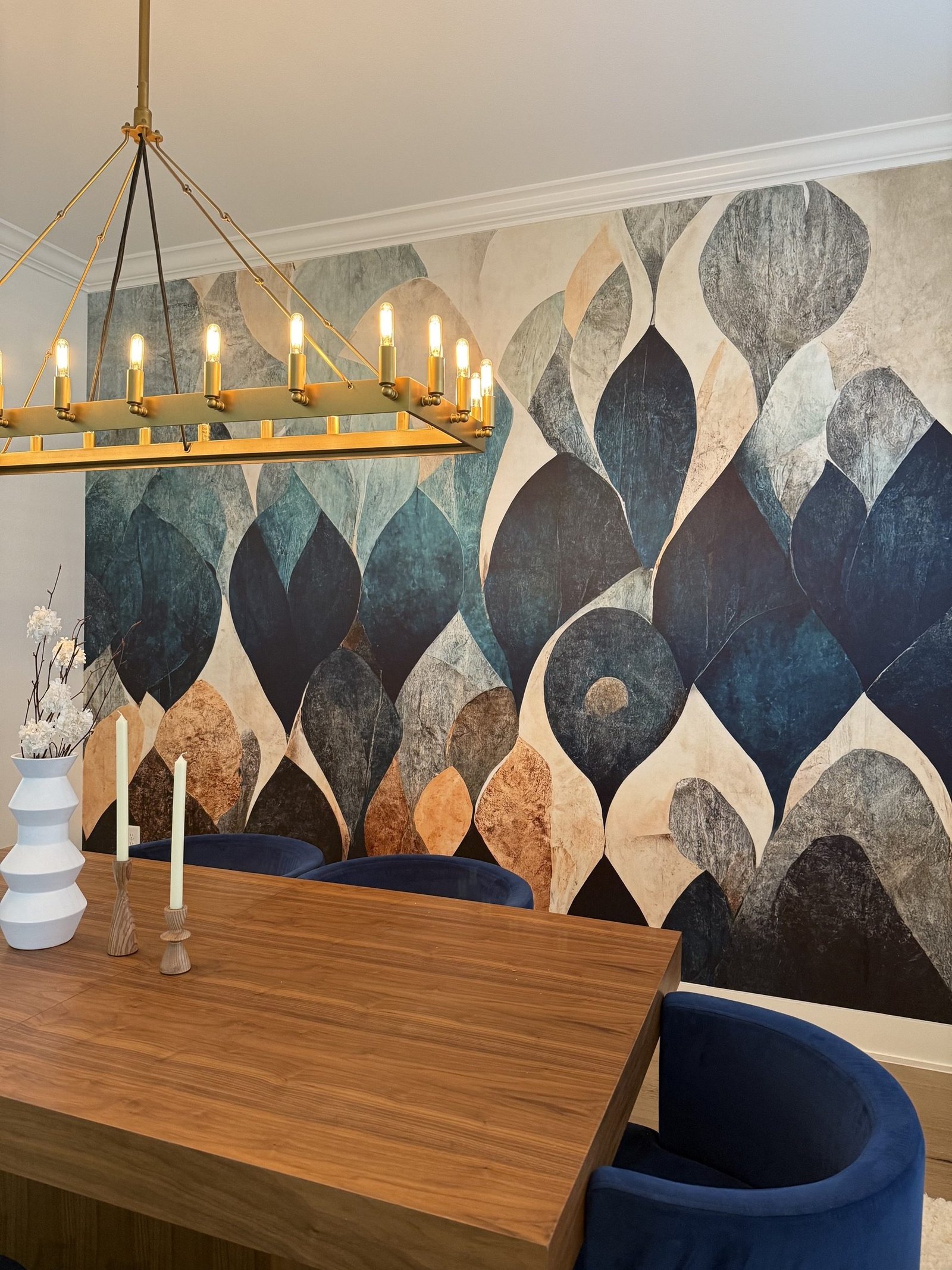 Blue geometric wallpaper installation in a Tampa Bay interior